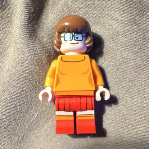 LEGO Minifigure Orange Sweater Torso, Red Skirt Legs, Brown Hair, Glasses