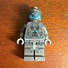 LEGO Dark Gray/Black Minifigure Figure w/ Blue Face Print Plastic