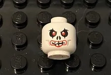 LEGO White Skeleton Skull Head With Red Eyes,  Red Lips, Curved Eyebrows