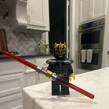 LEGO Minifigure Black Figure w/ Gold Crown Helmet and Red Double-Bladed Saber