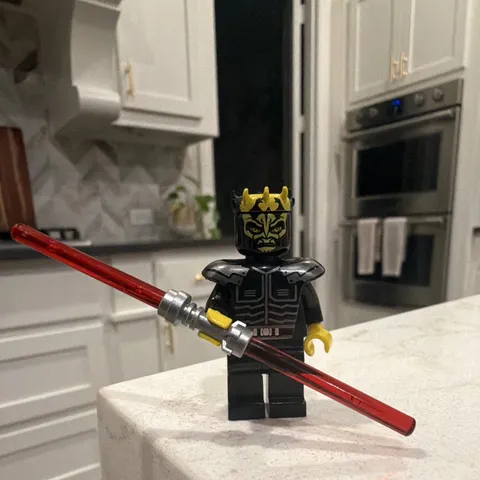 LEGO Minifigure Black Figure w/ Gold Crown Helmet and Red Double-Bladed Saber