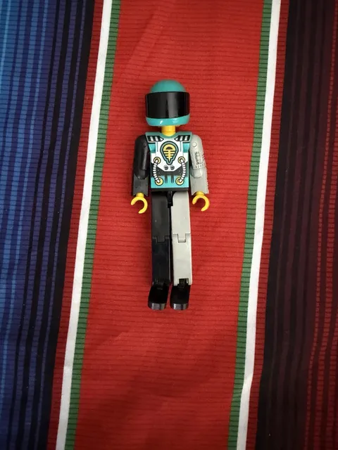 Vintage LEGO Technic Competition Figure with helmet 1990's--pre-owned 3.5" tall