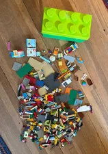 Over 4 pounds of Authentic Legos In A Lego Storage Brick