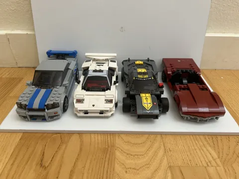 Set Of 4 LEGO Cars. 2 Are Complete And 2 Are Incomplete