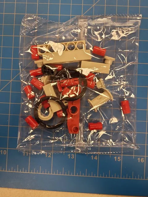 LEGO Technic Bulk Lot Red Connector Pins Tan Bricks Black Rubber Rings Spool