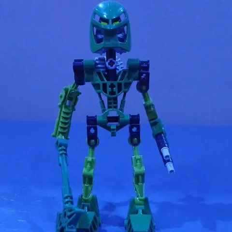 LEGO BIONICLE Green Plastic Figure with Mask Helmet, Gear & Weapon