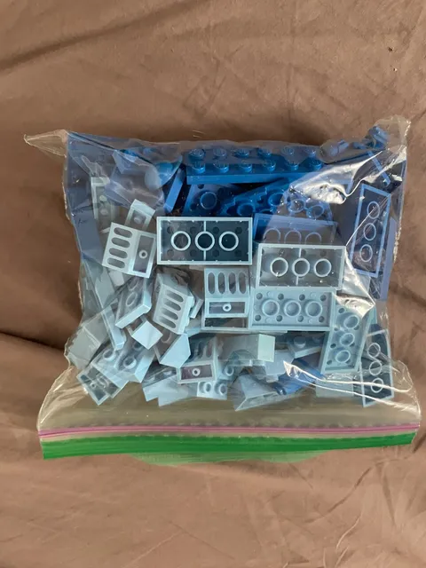 2 1/2 lb bags of random blue lego pieces - used pieces - random pieces
