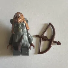 LEGO Minifigure Teebo with Bow & Arrow Accessory slightly used