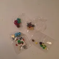 Lego Pieces 4 Bags Lady In Green Dress  & Castle & Others