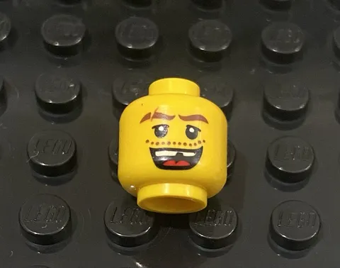 LEGO Yellow Minifig Head, Big Open Mouth Smile With A Missing Tooth
