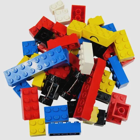 LEGO Bricks Lot of 56 - Vintage 1980s Pieces with Eyes, Wheels & Mouth