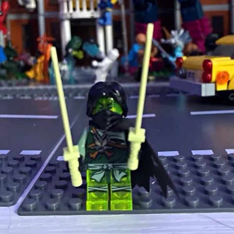 LEGO Minifigure w/ Black Cape, Black Hair, Green Legs, 2 Glow-in-the-Dark Swords