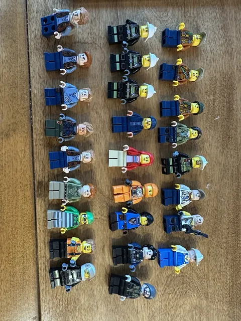 Lego Lot of 26 minifigs from City and Jurassic lines - As Shown 
