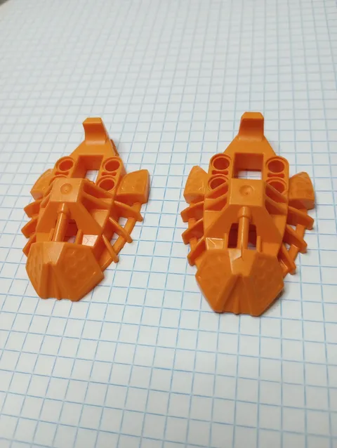 2 Bionicle Lego Orange battle damaged (see pictures) 53549 Foot Toa Inika type