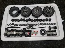 LOT OF LEGOS TIRES AND VARIOUS  CONECTORS 