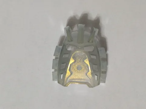 LEGO BIONICLE Kanohi Avohkii Mask Of Light Trans-Clear With Gold Glitter
