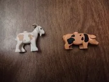 Rare Lego goat and pig from Mill Village Raid (7189), used but great condition!
