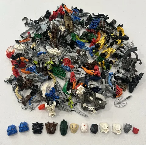 Lot of 2.5 LBS LEGO Bionicle Hero Factory Bulk Parts Weapons Heads and 12 Masks