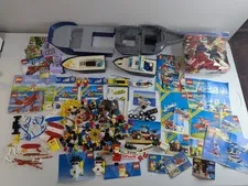 LEGO Misc Piece lot: Boats, Instruction Manuals, Some Minifigs. Vintage Used