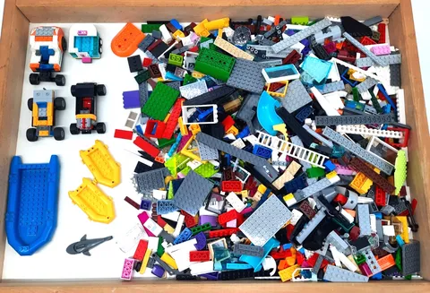 5 lbs Bulk LEGO Diverse Mix of Bricks, Car Frames, Rafts & Shark stored on (W2-P