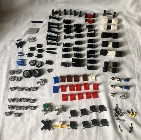 LEGO Mixed Lot Vehicles Wheels Tires Steering Axels Gear Shifts Propellers