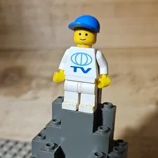 LEGO Plastic Minifigure White Outfit Blue TV Logo Torso & Blue Cap