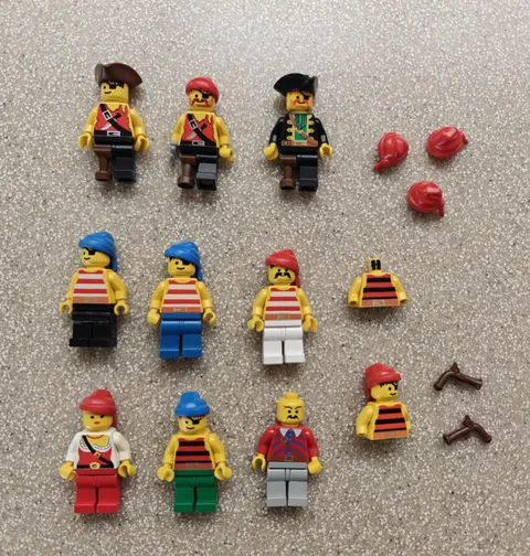 Vintage lot of 9 Lego pirate minifigures captain peg leg wench revolvers hats
