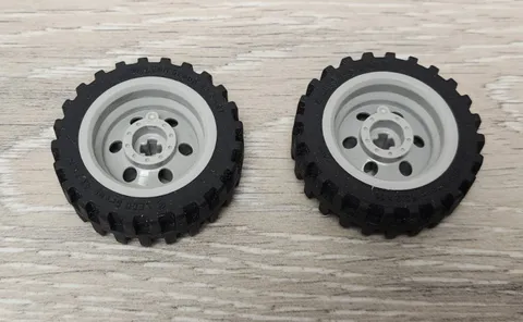 Lego 56898 Tire 43.2 x 14 Offset Tread & 56904 Light Bluish Gray Wheel Lot Of 2