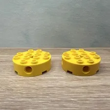 LEGO Part #6222 Round Brick 4x4 w/4 Pin Holes and Axle Hole, Yellow 2 Pcs