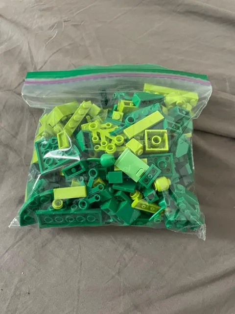 1/2 lb bag of random green lego pieces - used pieces - random pieces