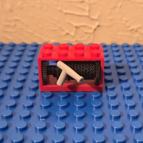 LEGO Fire Hose Reel Red w/ String - 2 x 4 x 2 (1981 - 2000)
