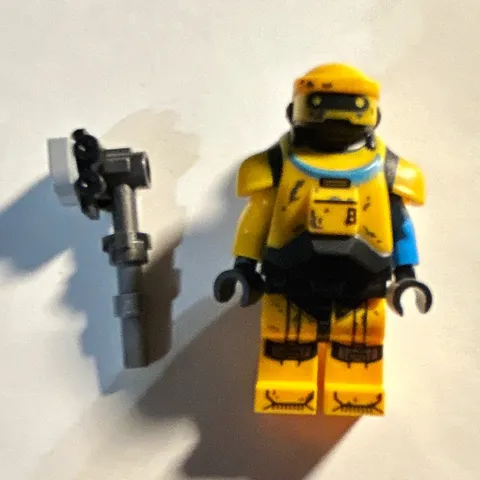 LEGO Yellow Minifigure w/ Black Helmet & Gray Accessory, 1 Piece