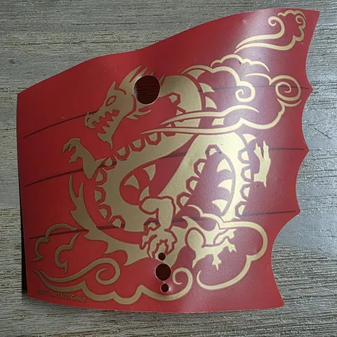 LEGO Plastic Sail, Scalloped with 4 Holes with Black Lines and Gold Dragon 71749