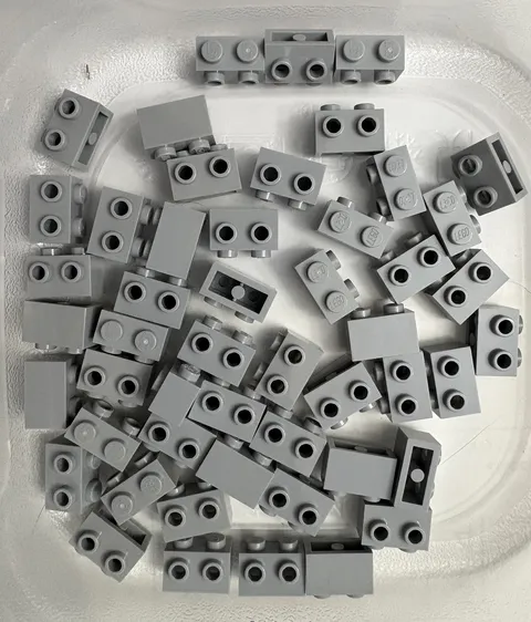 LEGO 50-piece Light Bluish Gray Brick, Modified 1 x 2 with Studs on 1 Side
