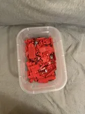 Red sorted Lego bricks 