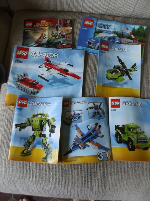 Lot of 7 Lego Instruction Manuals Marvel super heros City Creator