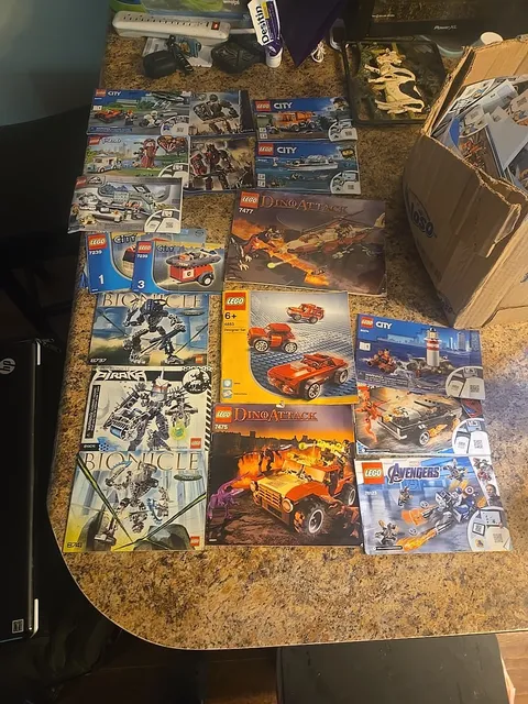 About 70 Ish Used Manuals That Have DC,Marvel,Star Wars,Ninjago,friends, Bionic