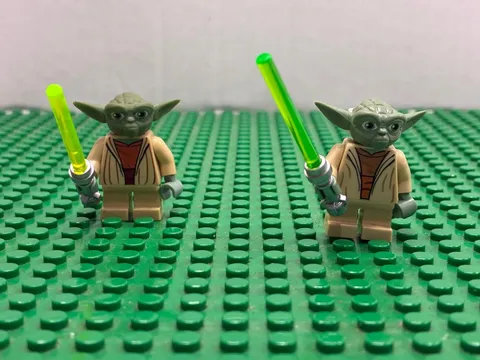 Lego Star Wars Yodas minifigures from the Clone Wars, with lightsabers Original