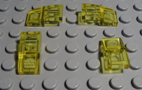 Lego Brick Rounded 1x2x2/3 Transparent Yellow 4 Pieces