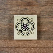 LEGO Tan Slope Curved 2x2x2/3 Black Ornate with Copper Shield Pattern 15068pb496