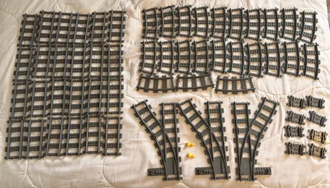 LEGO - 3 track exchanges, 2 yellow tools, 24 straight, 23 curved, 8 flexible
