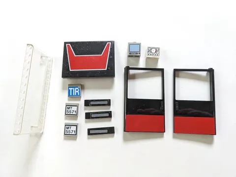 Lot of LEGO stickered pieces from Model Team set Giant Truck (5571); inc. doors