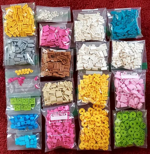 LEGO, a 2 lb 10oz Assortment of LEGO pieces, 39 separate bags