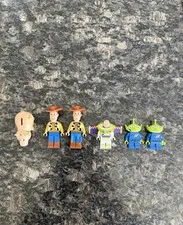 Lego Toy Story:  Woody, 2 Aliens, Hamm w/ Cork, Buzz Lightyear Minifigures