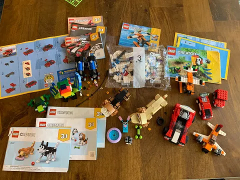 Lego 31137 Dogs + 31031 Rainforest Animals + 7 other creator sets 31100 Sports