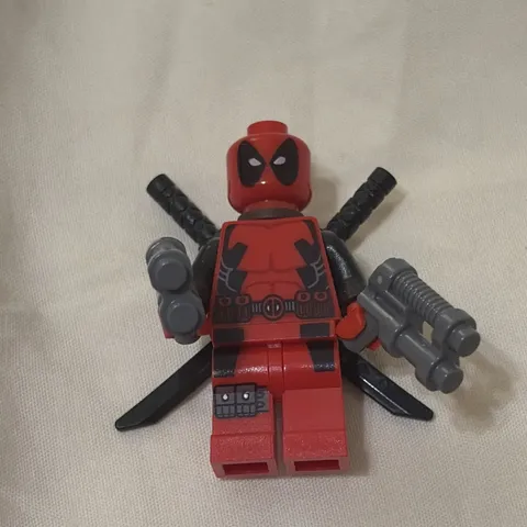 LEGO Deadpool Minifigure W/Brown Backpack Accessory.  100% Official LEGO