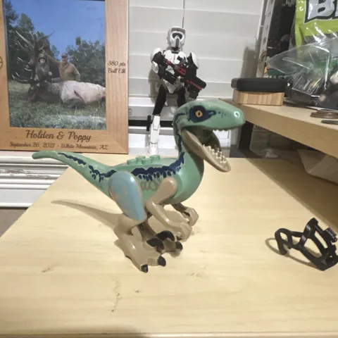 LEGO Jurassic World Velociraptor Blue printed dinosaur figure with camera