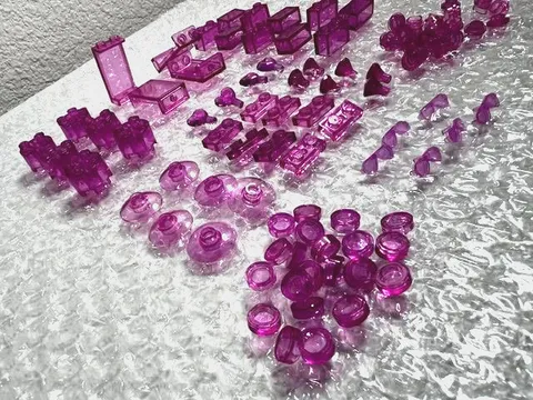 LEGO Lot of 98 Translucent Pink 1x1 Tile Round & plates, 1x2 plate, and more.