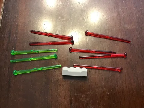 Lego Projectile Launcher 1x4 Spring Shooter With Trans red and green darts