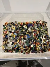 3 pounds of Lego Accessories (Pants, tops, heads, helmets, and armor)